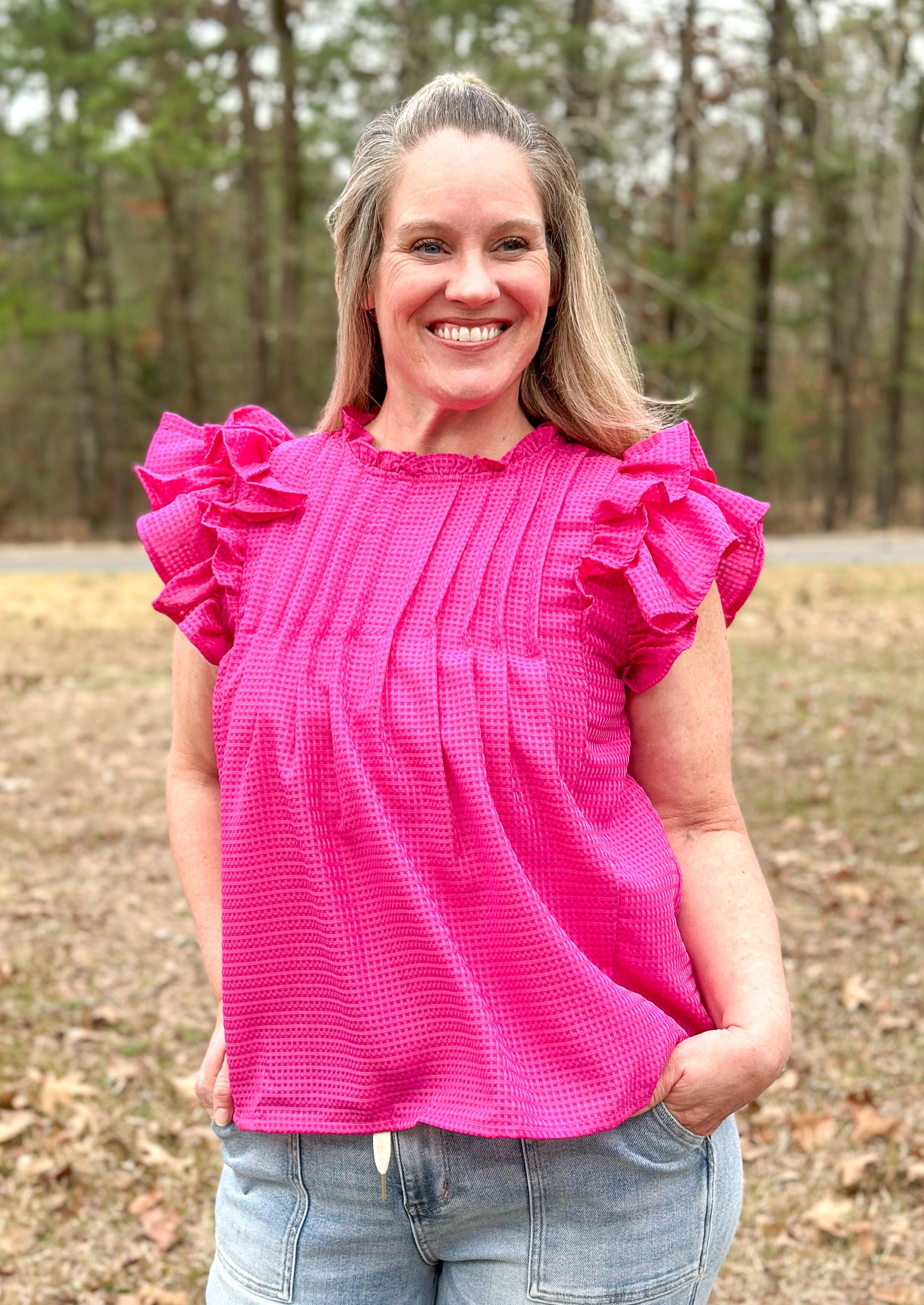 Double ruffle short sleeve top, waffle texture, ruffle neck, keyhole back with button closure, pleated detail on the top