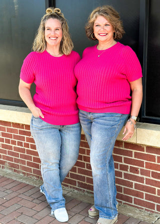 judy blue "dad" jeans - mid rise - slight distressing at the hem - relaxed fit - button and zipper closure - front and back pockets with hidden cell phone pocket above right back pocket