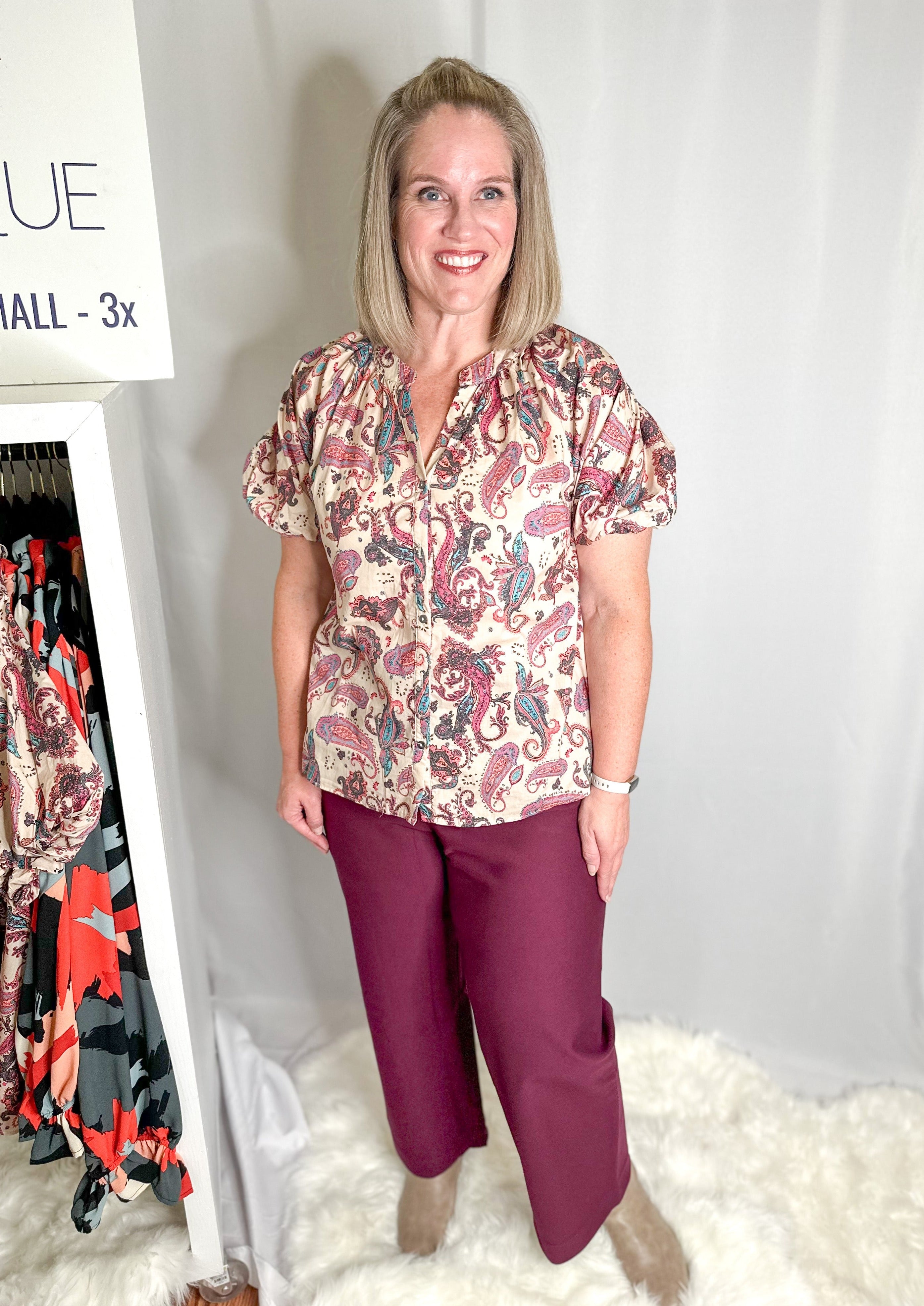 Cropped pants in the color wine paired with our taupe button down top.
