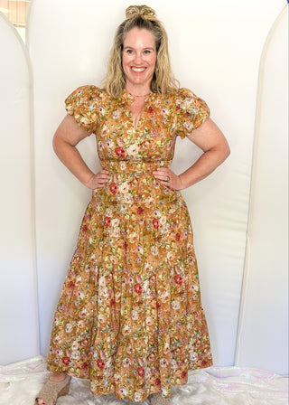 Terracotta with fall florals short sleeve tiered maxi dress.  V-neck and Puff Sleeve and lined.