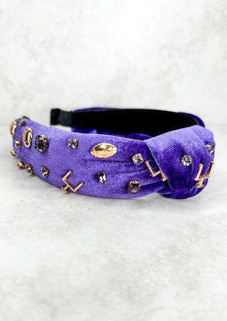 This velvet headband has gold footballs, goal posts and purple sparkles on it!