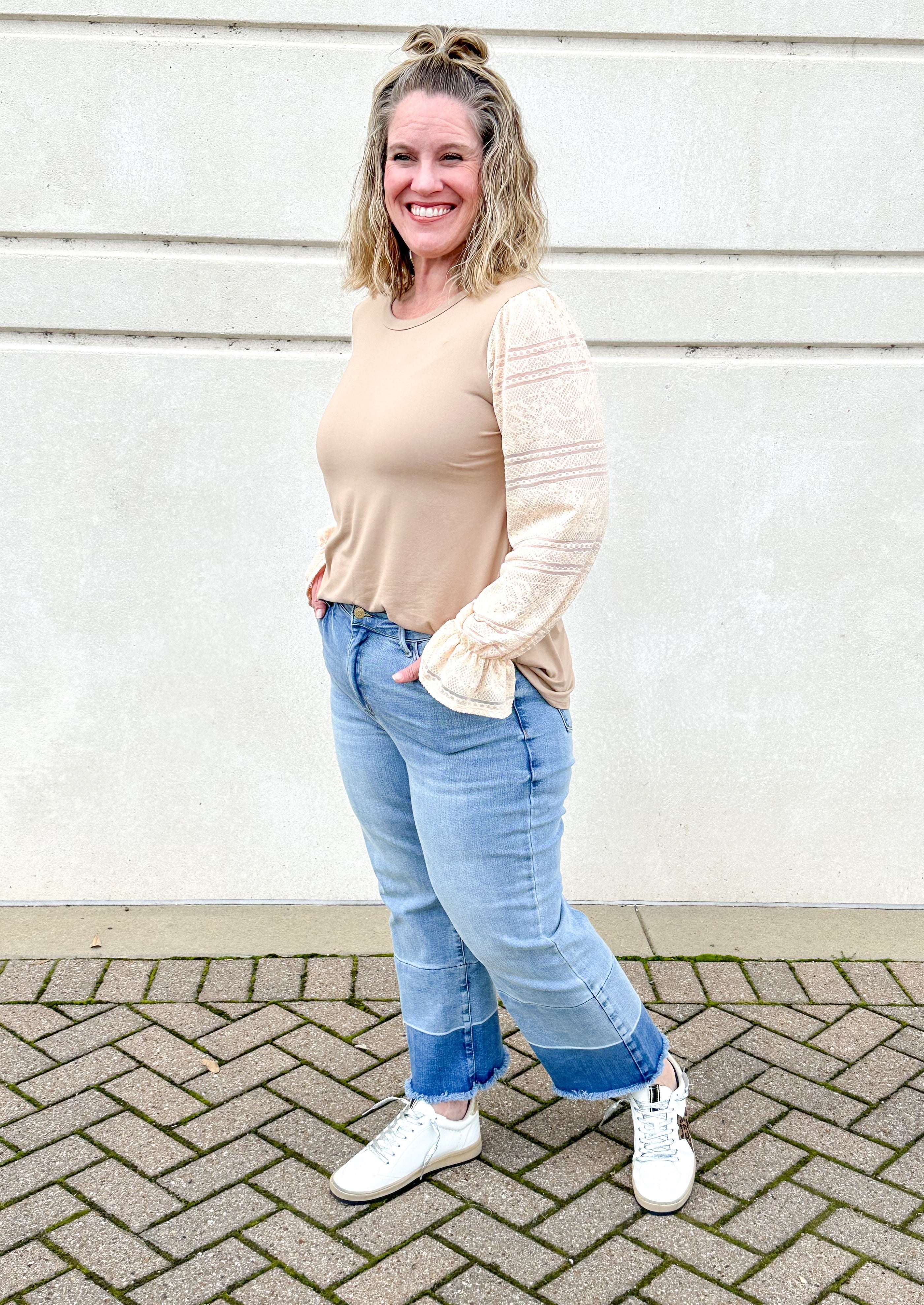 Judy Blue cropped wide leg blue jeans with frayed hem, front button and zipper closure, belt loops, front and back pockets, darker colored blue band at the bottom of each leg