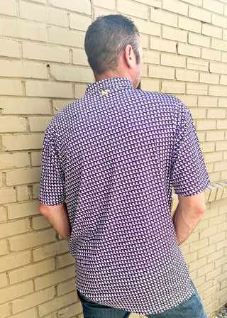 purple shirt with rows of the state of louisiana shape in white and gold embroidered emblem on left chest - polo with button
