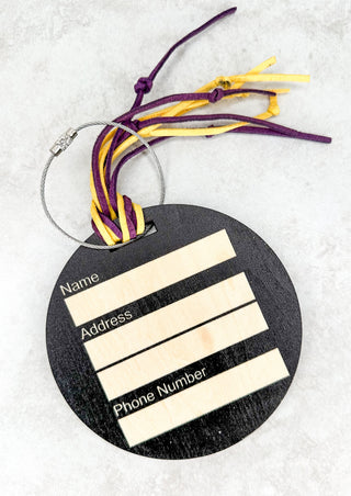 Wooden purple and gold GAME DAY luggage tag has space on the back to fill in your name, address and phone number