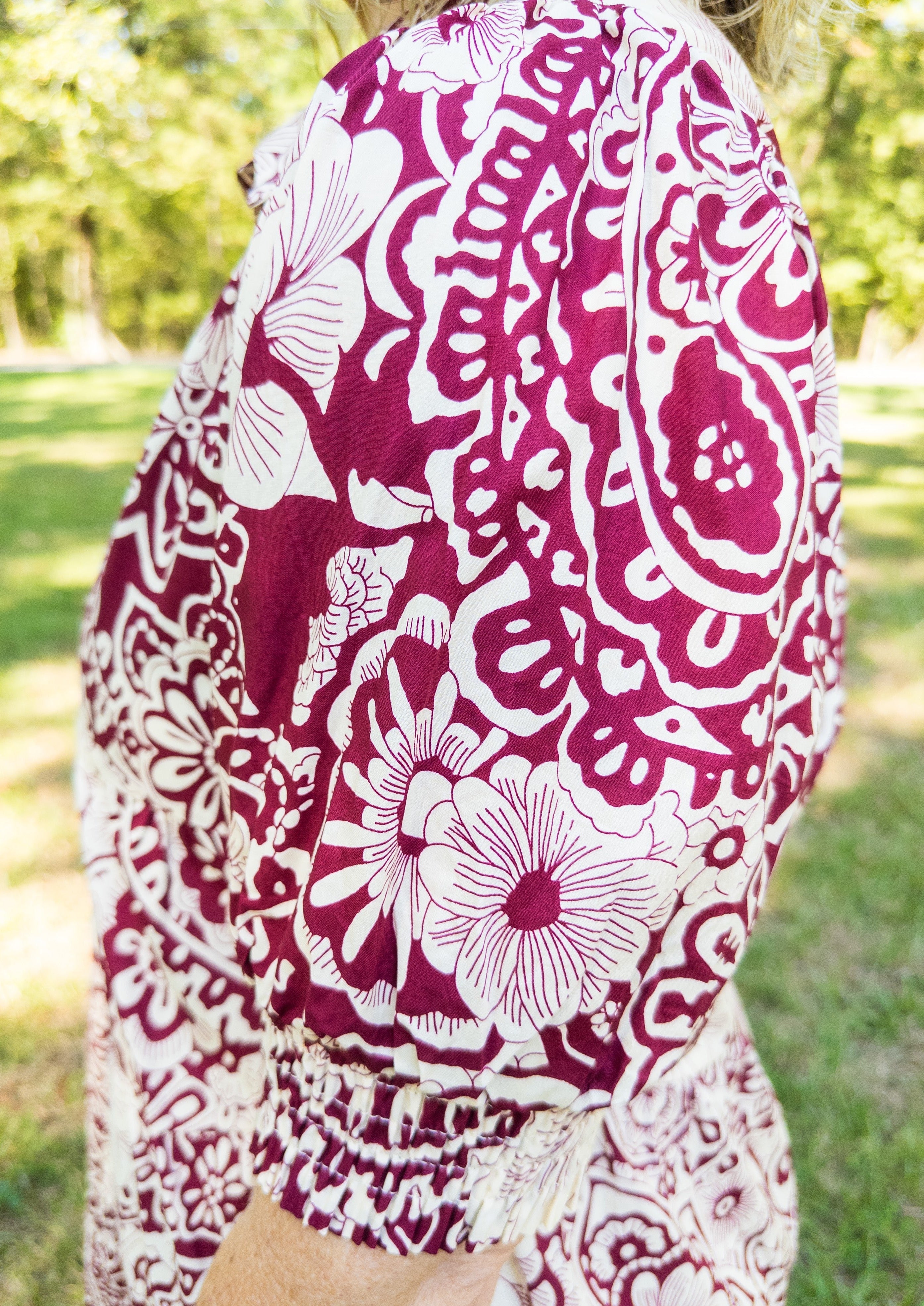 Side view of sleeve close up. Showing details in the pattern and the elastic banded cuff.