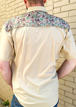 beige button up shirt with collar - front chest pockets - camo design on upper body, shoulders and upper body on the back