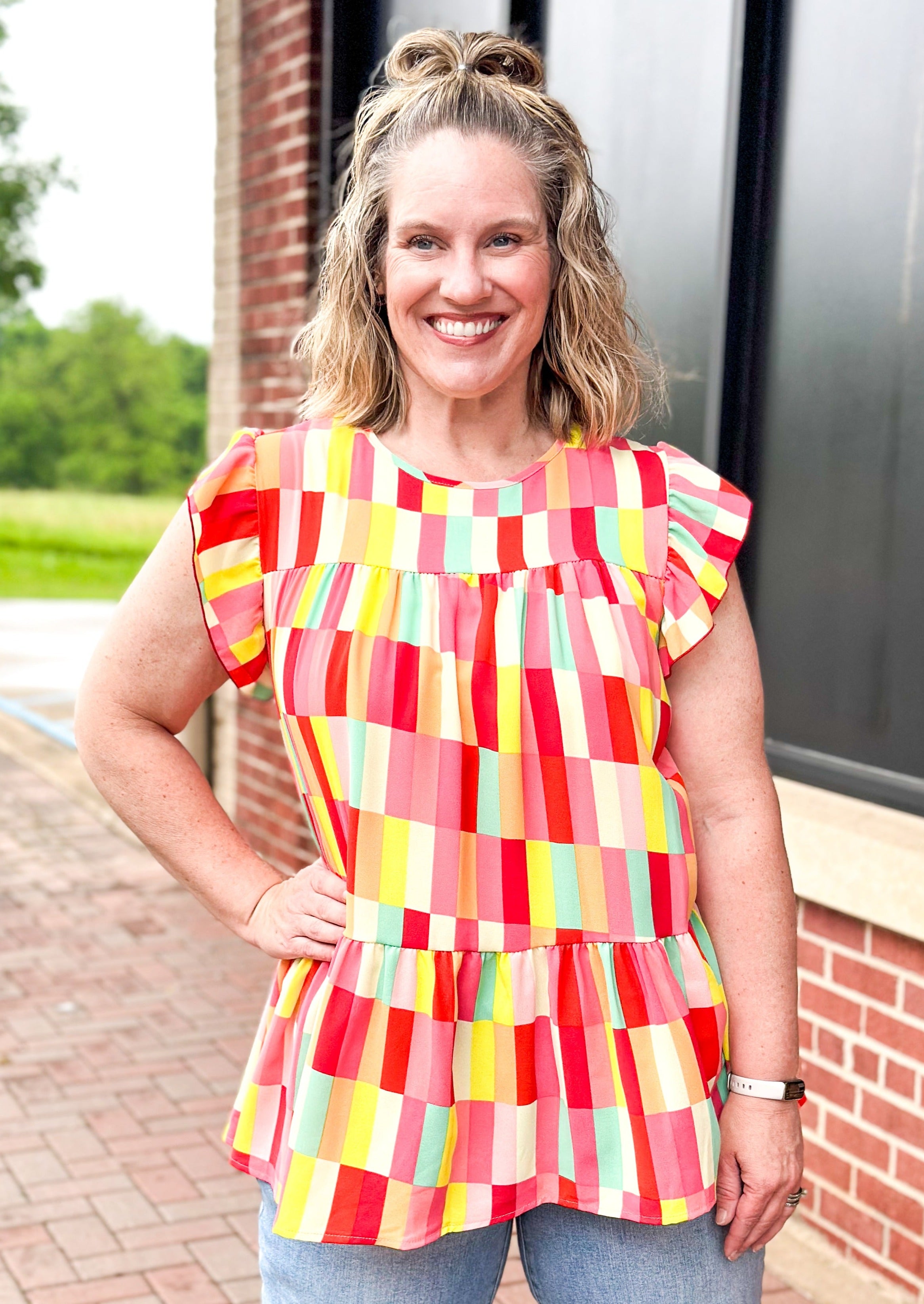 Ruffle Frill Short Sleeve Geometric print top - reds, whites, pinks, yellows, orange and some mint green - round neck - low ruffle - great length