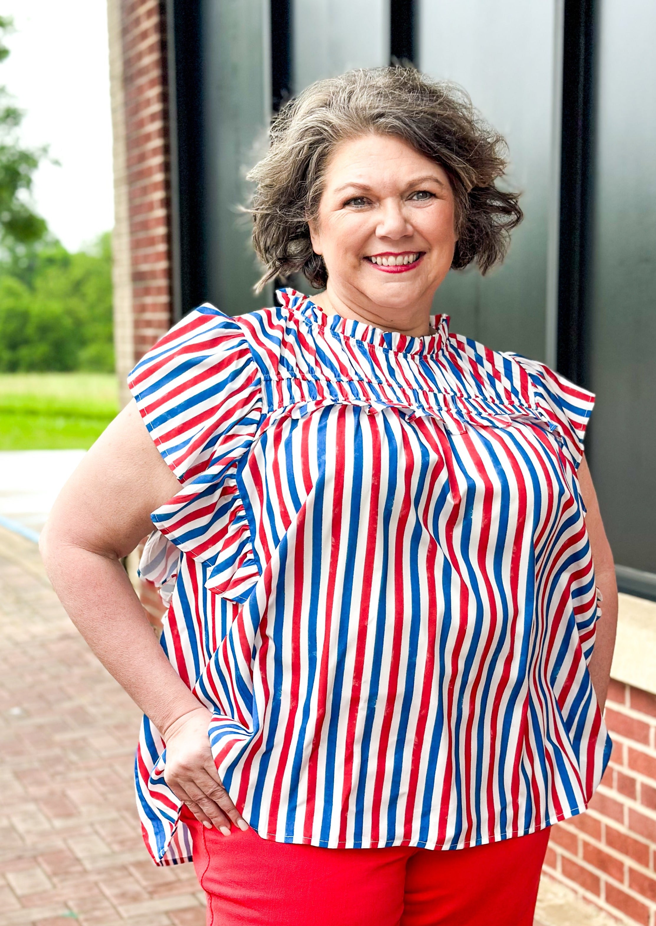 red, white and blue striped flutter sleeve top with smocking up top, ruffle round neckline and on top of bust - light and flowy
