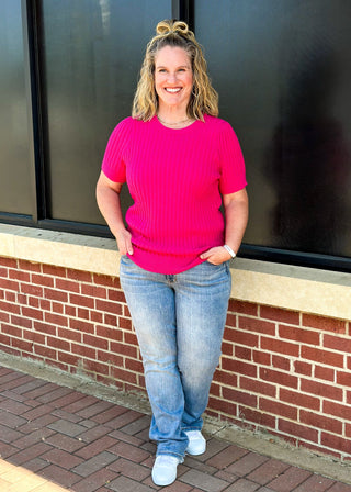 judy blue "dad" jeans - mid rise - slight distressing at the hem - relaxed fit - button and zipper closure - front and back pockets with hidden cell phone pocket above right back pocket