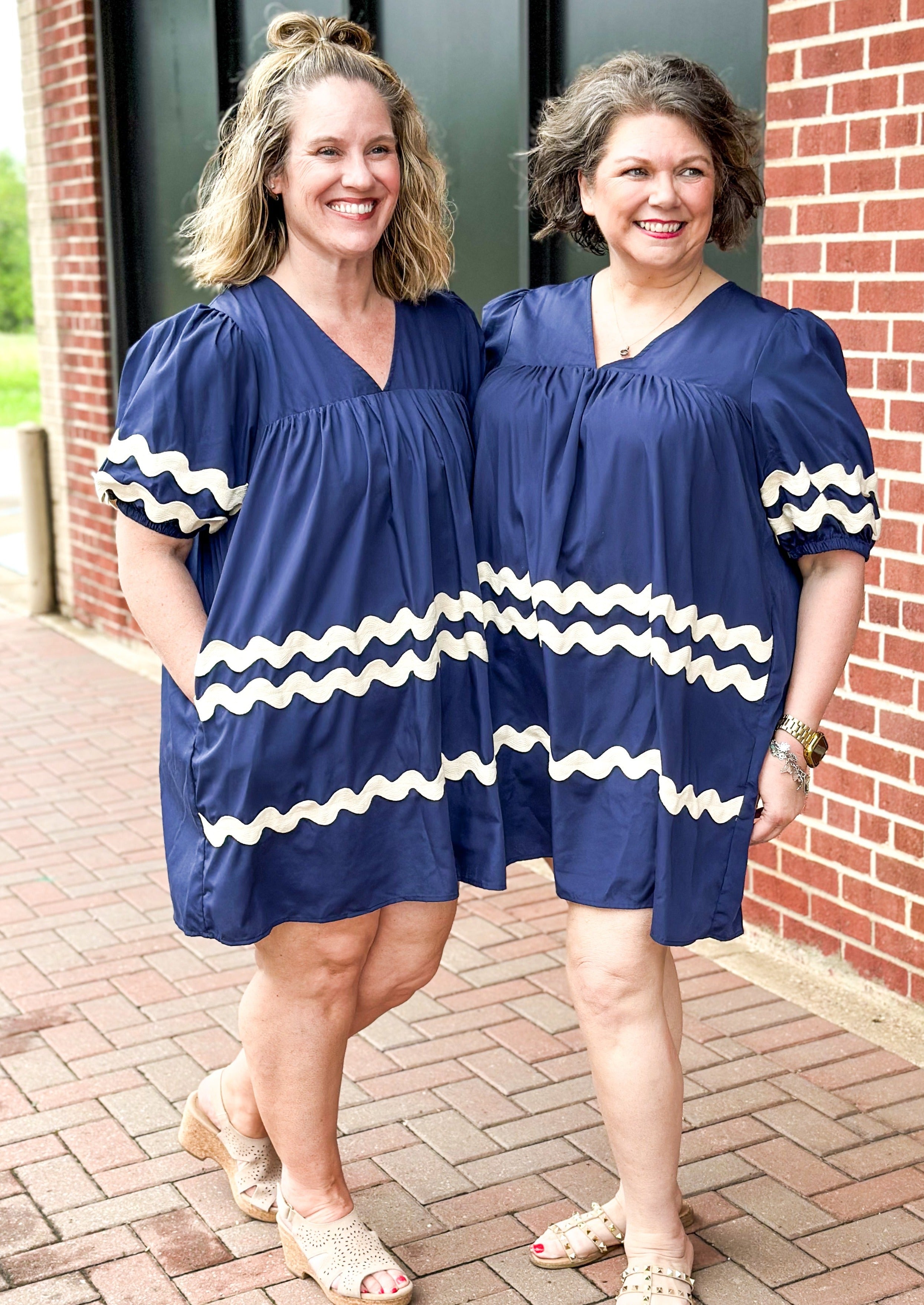 Navy Rick Rack v-neck short sleeve dress - cream rick rack around bottom of short sleeves and on the front only of the dress - pockets