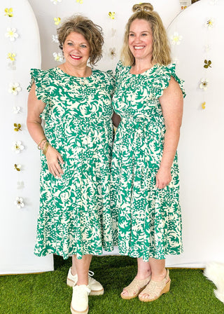 Kelly Green and white midi dress with pockets- ruffle sleeve with round neckline.