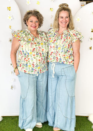 Lightweight chambray palazzo pants with pockets.  White rope drawstring waist.
