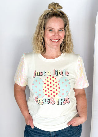 white short sequin sleeve top with "just a little eggstra" in pastels on the front - iridescent sequins on sleeves