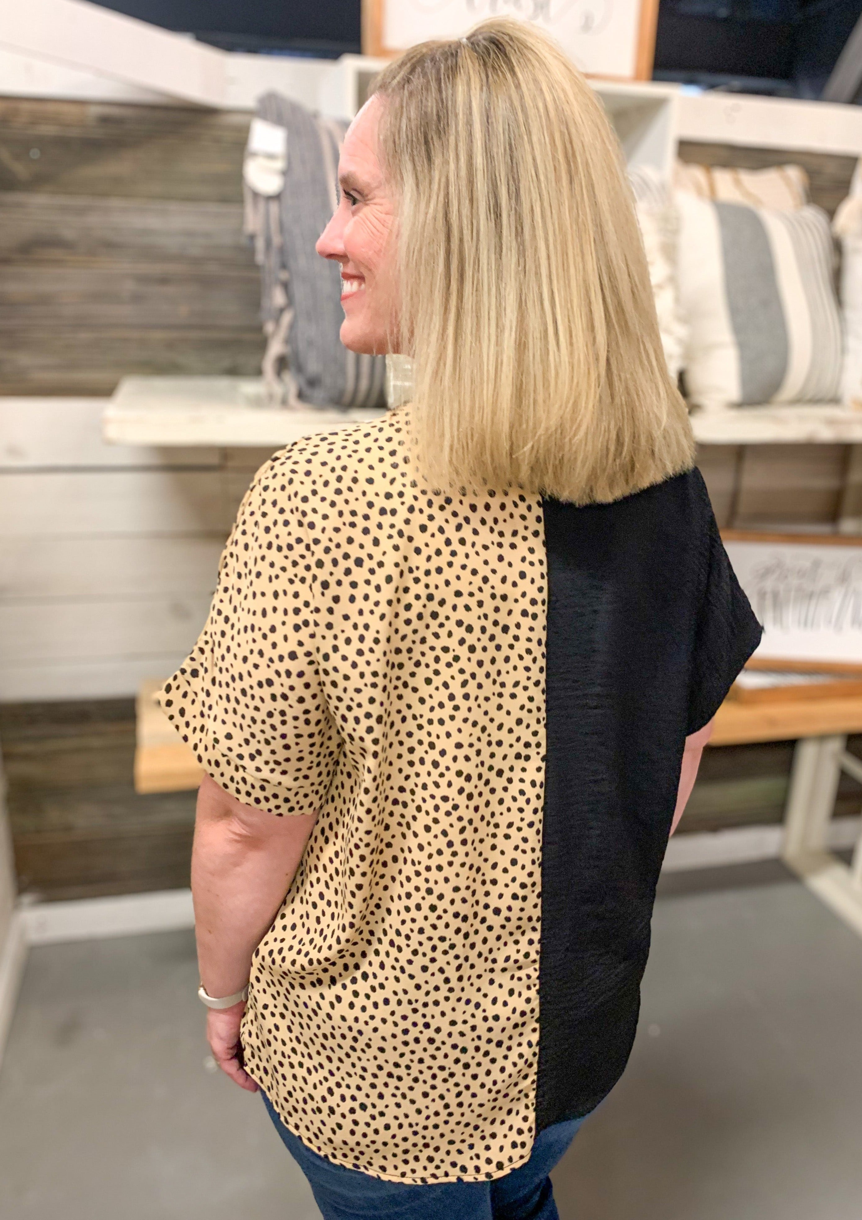Back of Spotted and Black Short Sleeve V-Neck Top
