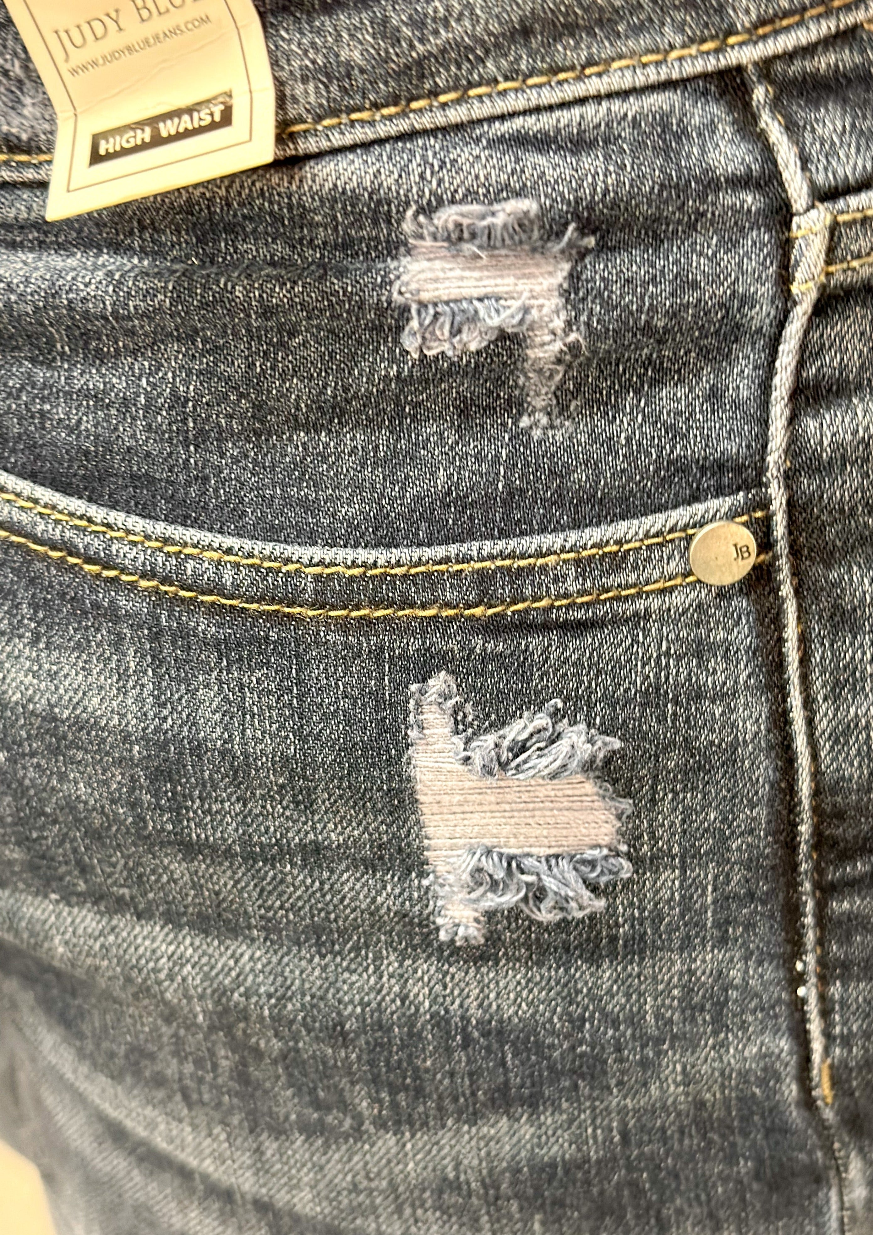 Judy Blue Unfinished Hem Hi Rise Tummy Control Skinny Jean with front and back pockets, zipper and front button closure