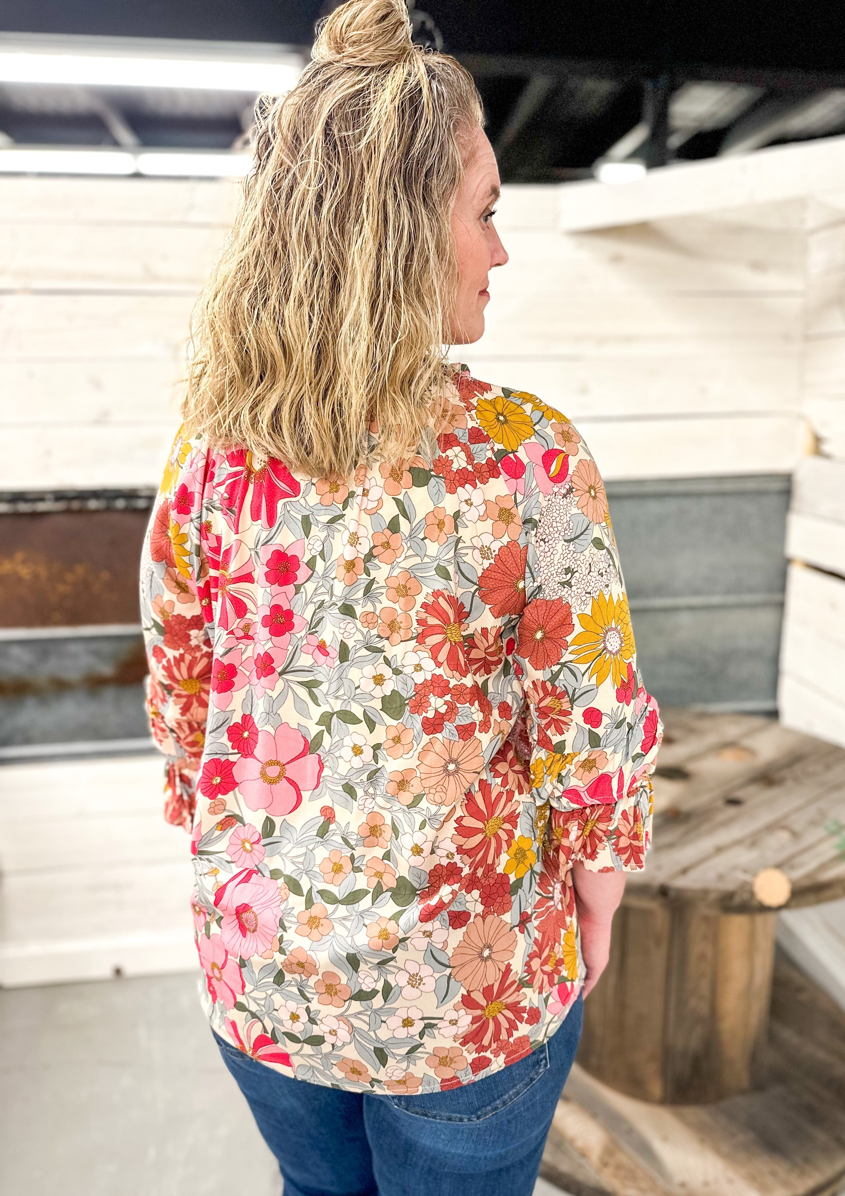 Pink and Green 3/4 length sleeve Floral Top with double ruffle on the sleeve, ruffle around color, tie collar