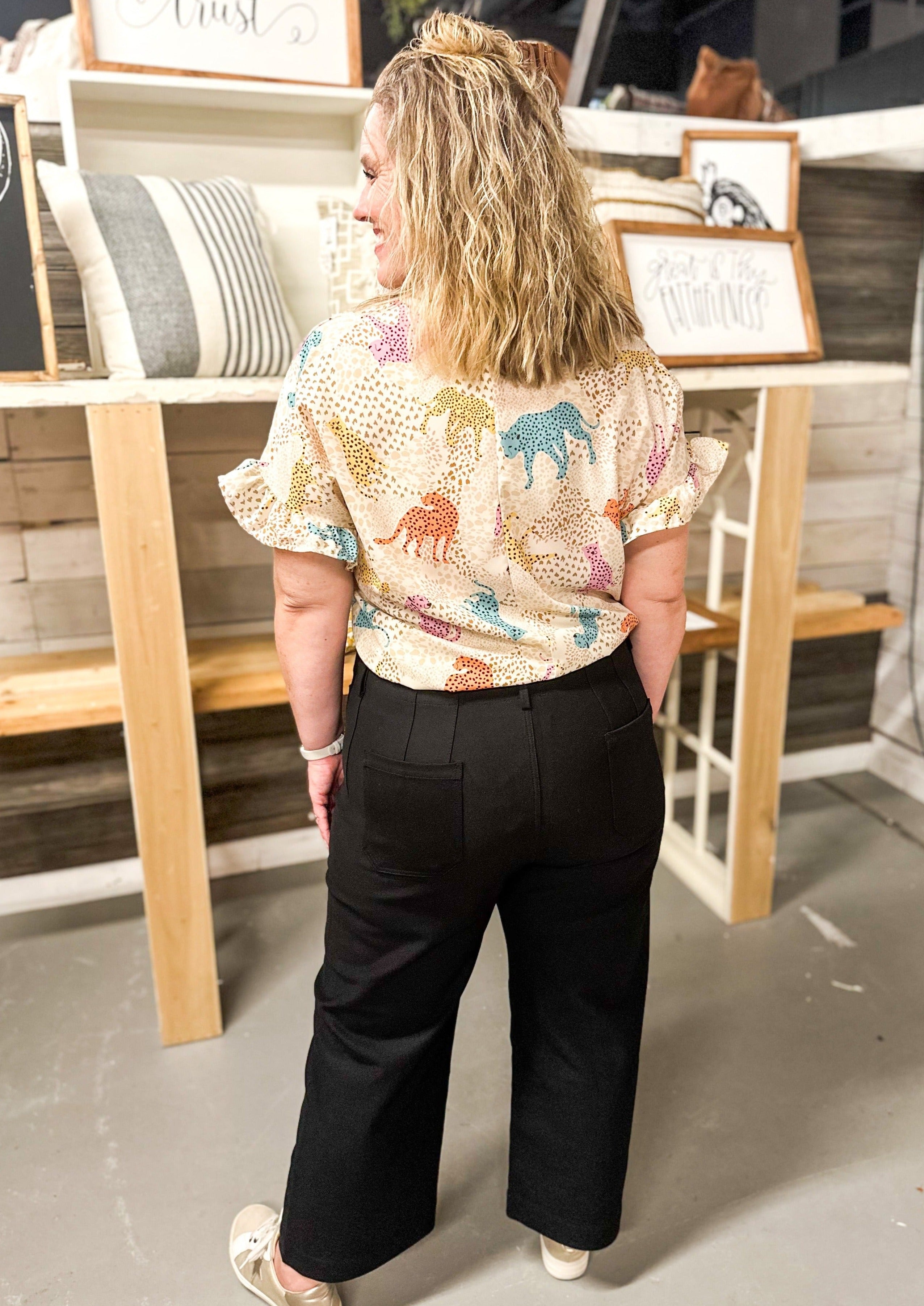 Cropped Pants - Black - stretchy with fitted top and wide leg - zipper with interior and exterior button closure - front and back pockets