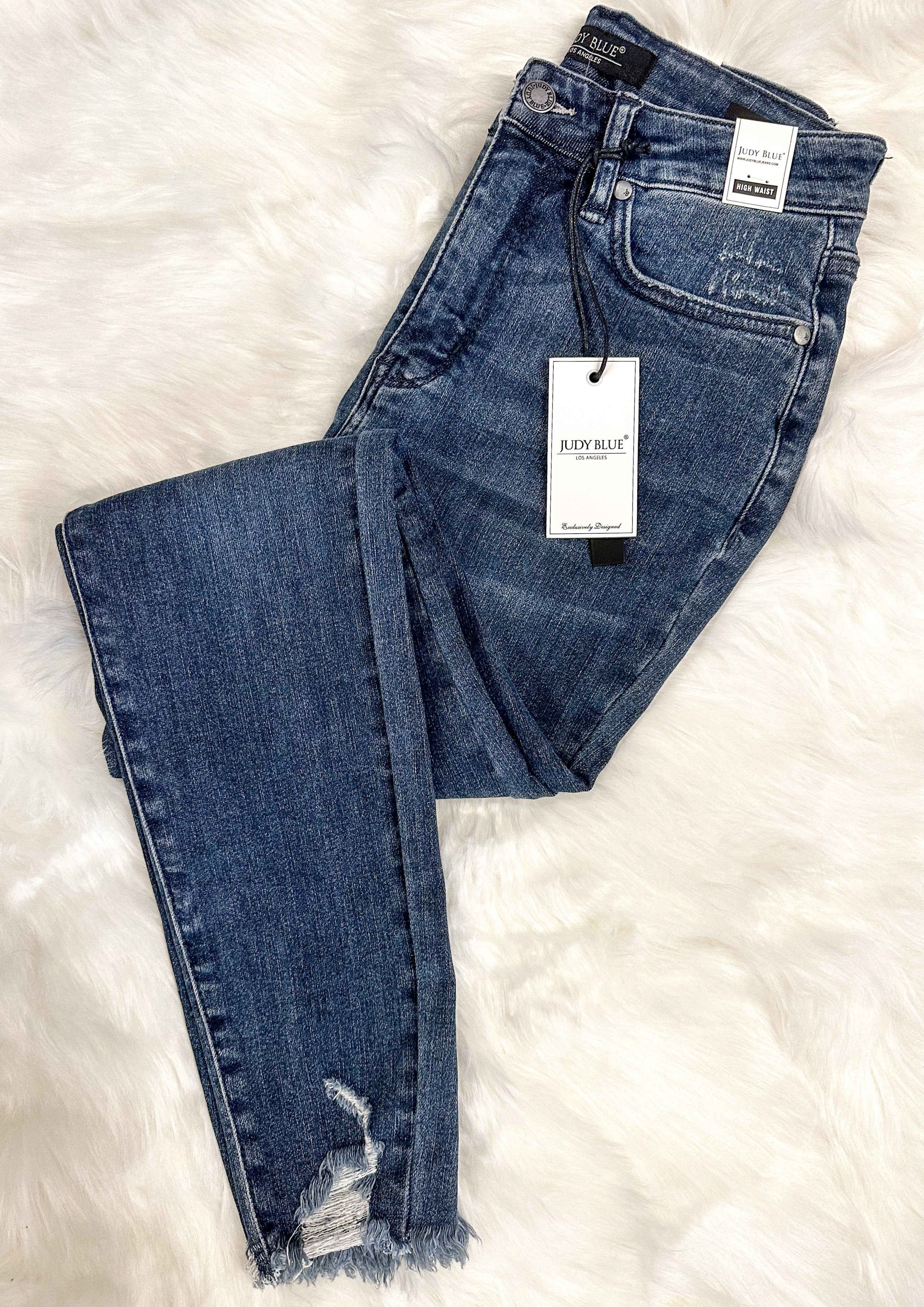 Judy Blue Distressed Hem Hi Rise Tummy Control Skinny Jean with front and back pockets, front zipper and button closure