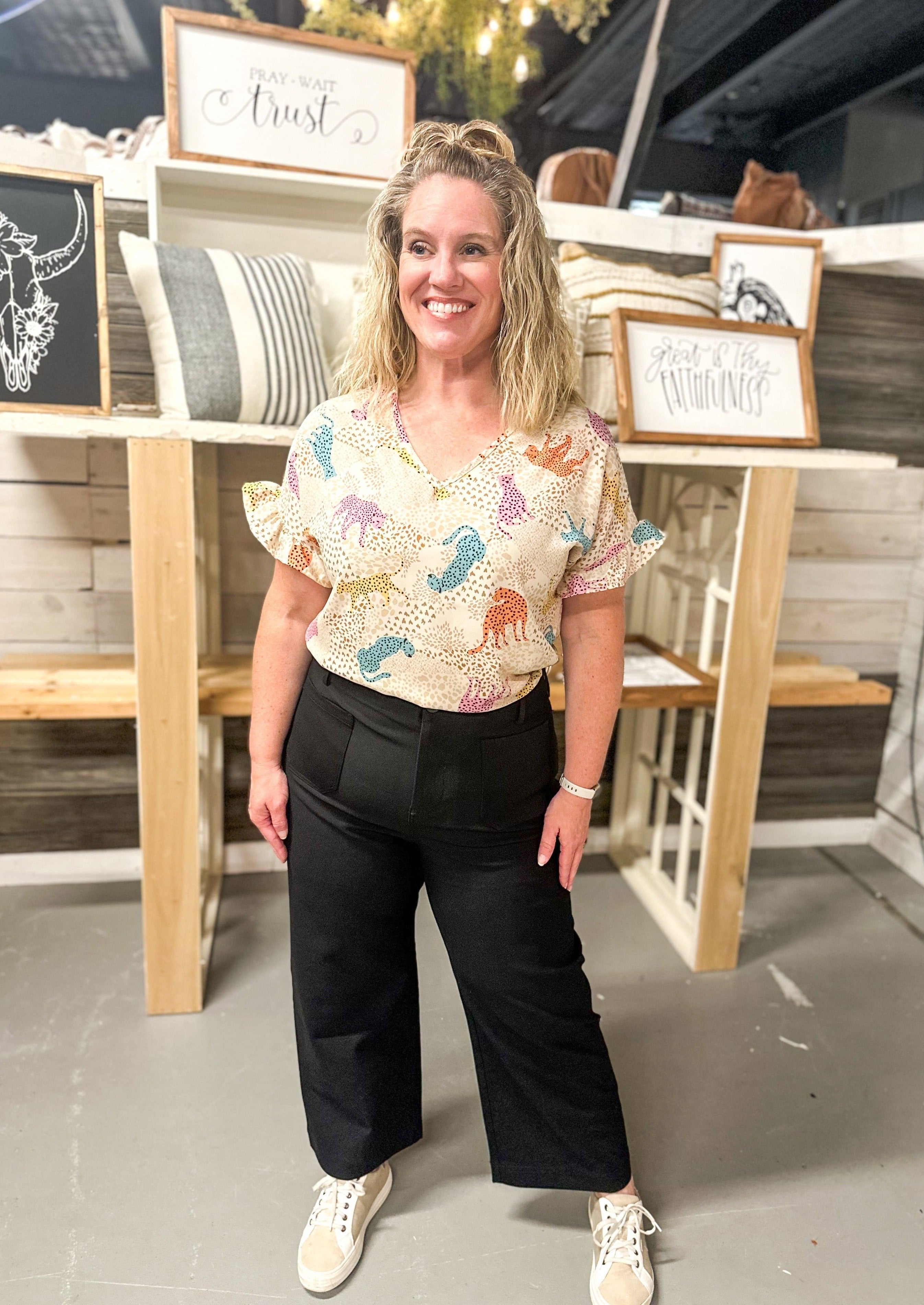 Cropped Pants - Black - stretchy with fitted top and wide leg - zipper with interior and exterior button closure - front and back pockets