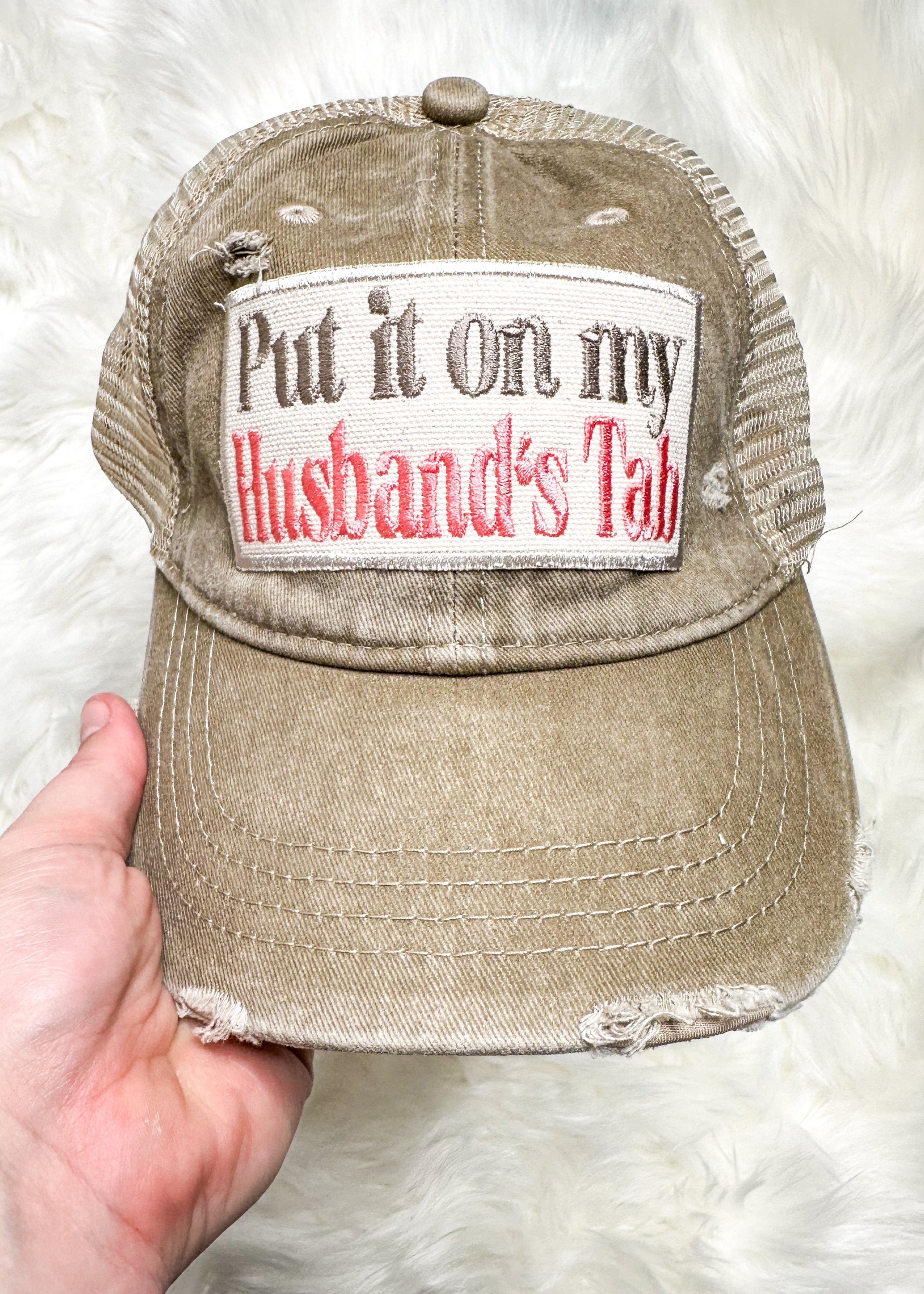 khaki snap back trucker hat - neutral and pink put it on my husband's tab embroidered patch on the front