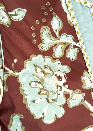 close up of brown floral top fabric
