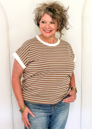 wide striped top with cuffed sleeves, and white banded rounded neckline.