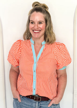 Striped button-down top with V-neckline, short puff sleeves, and contrast trim detailing