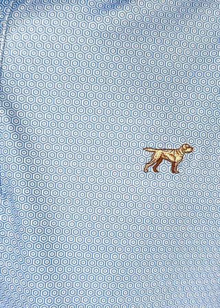 Close up of performance polo in light blue with geometric pattern.