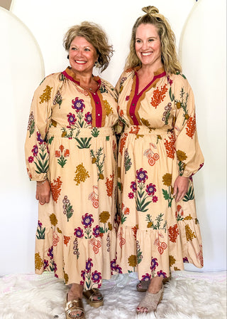 Camel background midi dress with multicolor floral design and long sleeves
