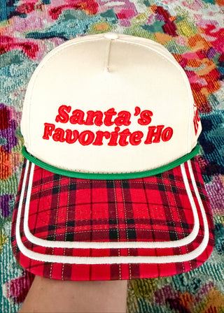 'Santa's Favorite Ho' snapback hat with plaid bill and embroidered lettering.  