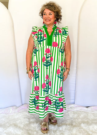 Green and white striped midi dress with pink floral print, flutter sleeves, contrast V-neckline, and a flowy tiered hem