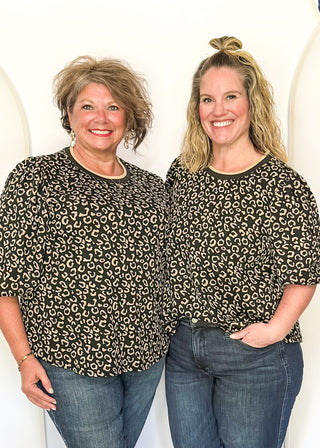 Animal print puff sleeve top with striped collar and cuffs