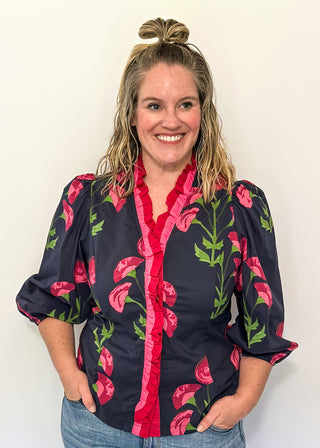 navy floral button up top with pink flowers and 2 shades of pink trim/ruffles along collar and down center