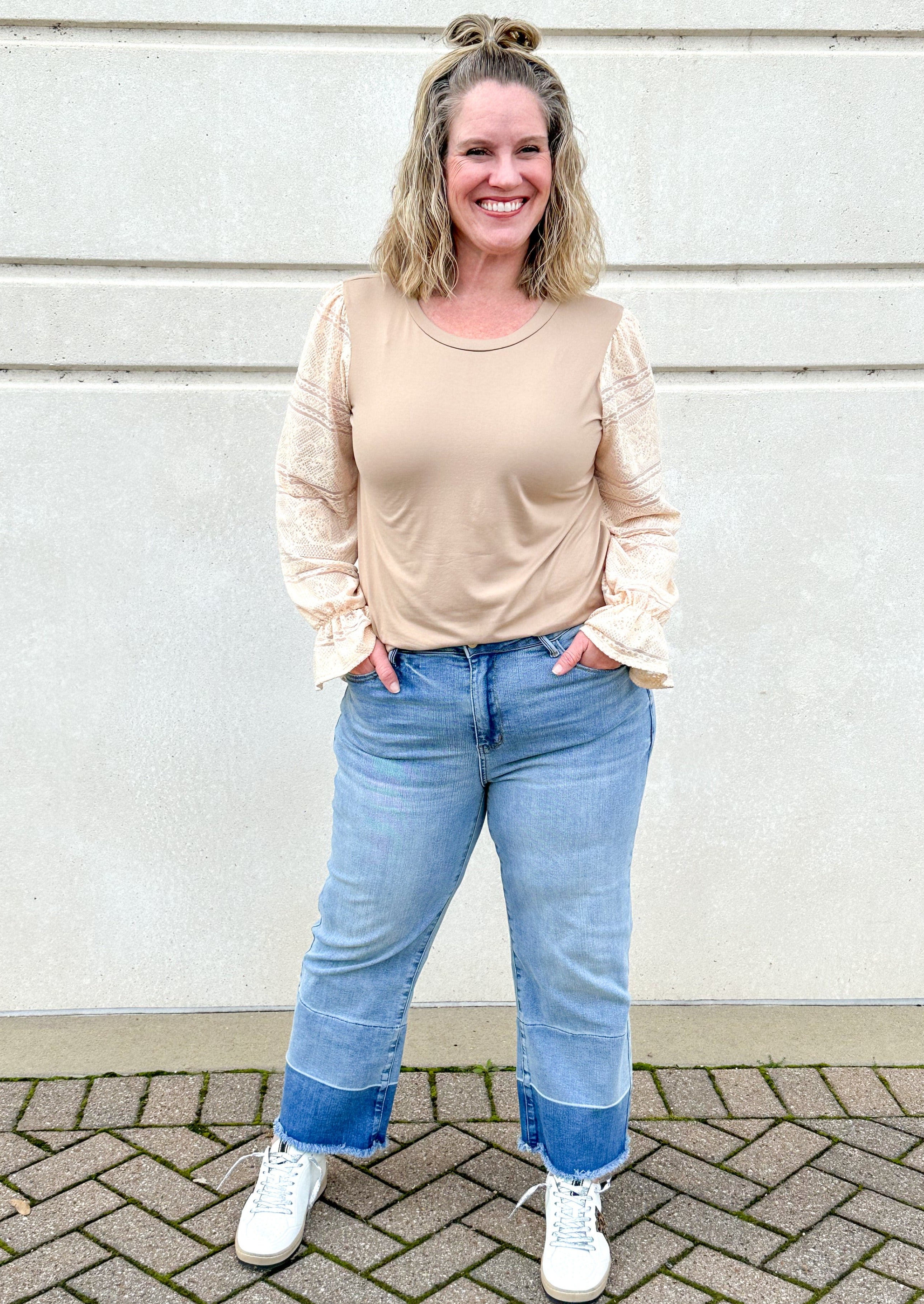 Judy Blue cropped wide leg blue jeans with frayed hem, front button and zipper closure, belt loops, front and back pockets, darker colored blue band at the bottom of each leg
