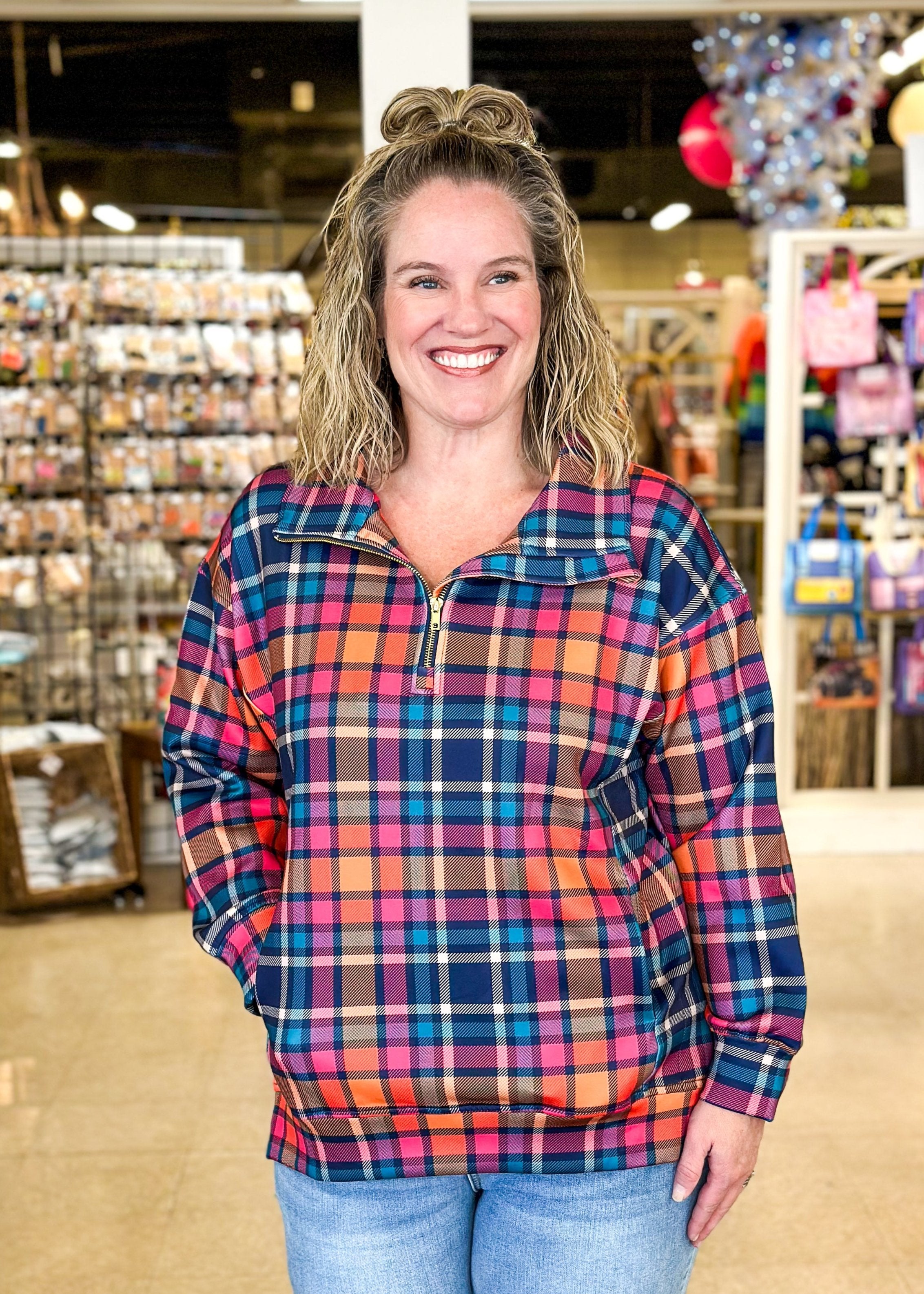 Rainbow colored plaid pullover with high low hem, pockets, ¾ zip neck – long sleeve