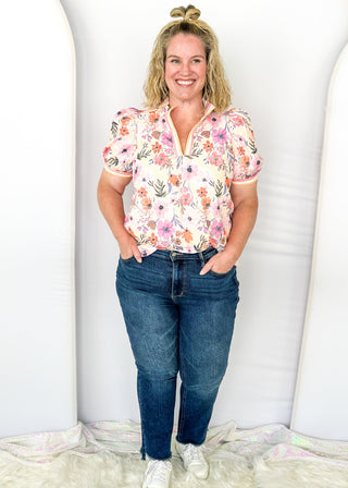 judy blue dark wash high waist kick flare jeans with a raw hem that's high low - front zipper and button closure - front and back pockets