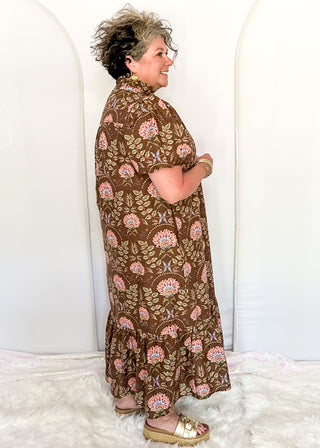 women wearing brown midi dress with floral pattern