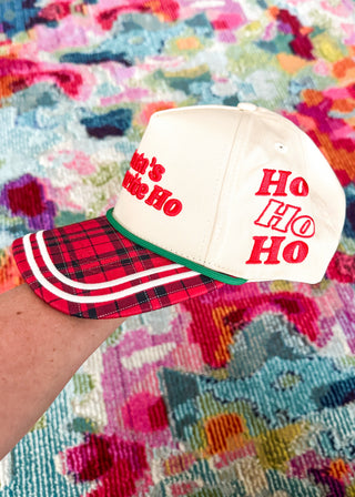 snapback hat with embroidered lettering on front and side.