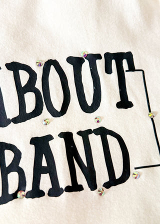 close up of rhinestone detail on graphic tee