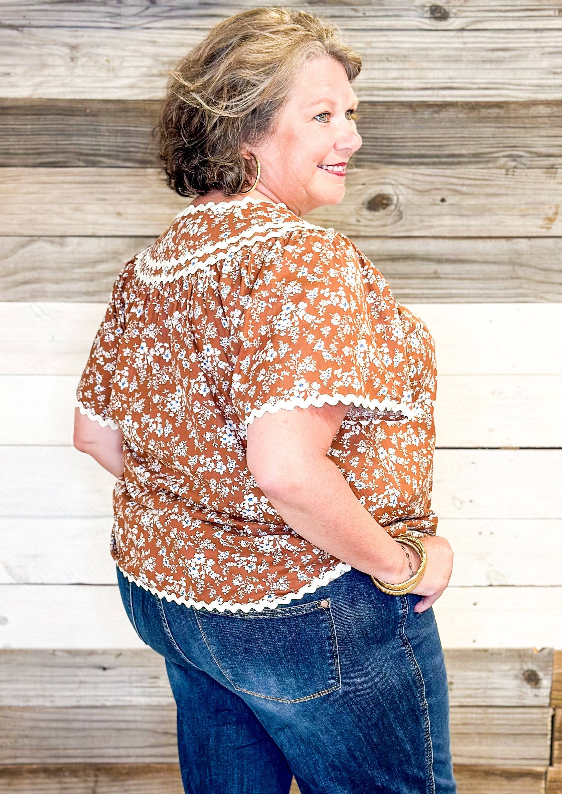 brown floral with hints of blue top - rick rack edging detail - small v-neck top with tie neck