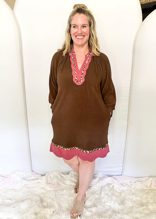 Brown ribbed v-neck dress with pink scallop trim and leopard print contrast. 