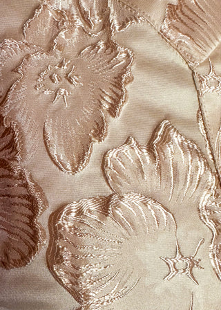 close up of jacquard floral puff sleeve top in champagne.