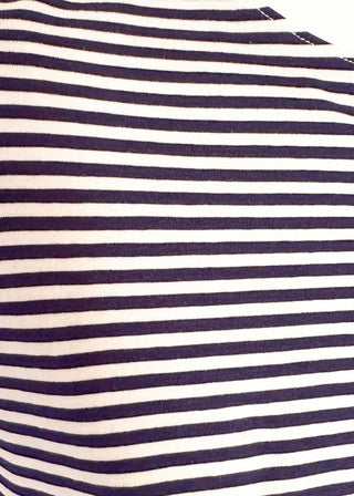 Striped knit dolman top with crew neckline and ribbed trim in navy.