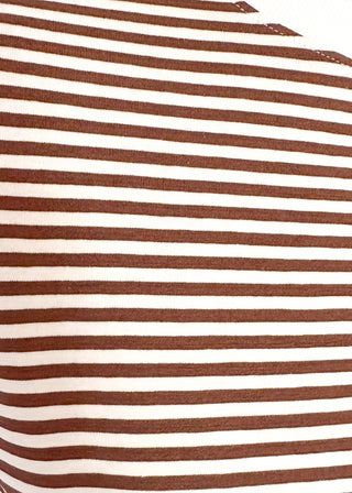 Close up of striped knit dolman top with crew neckline and ribbed trim in red.