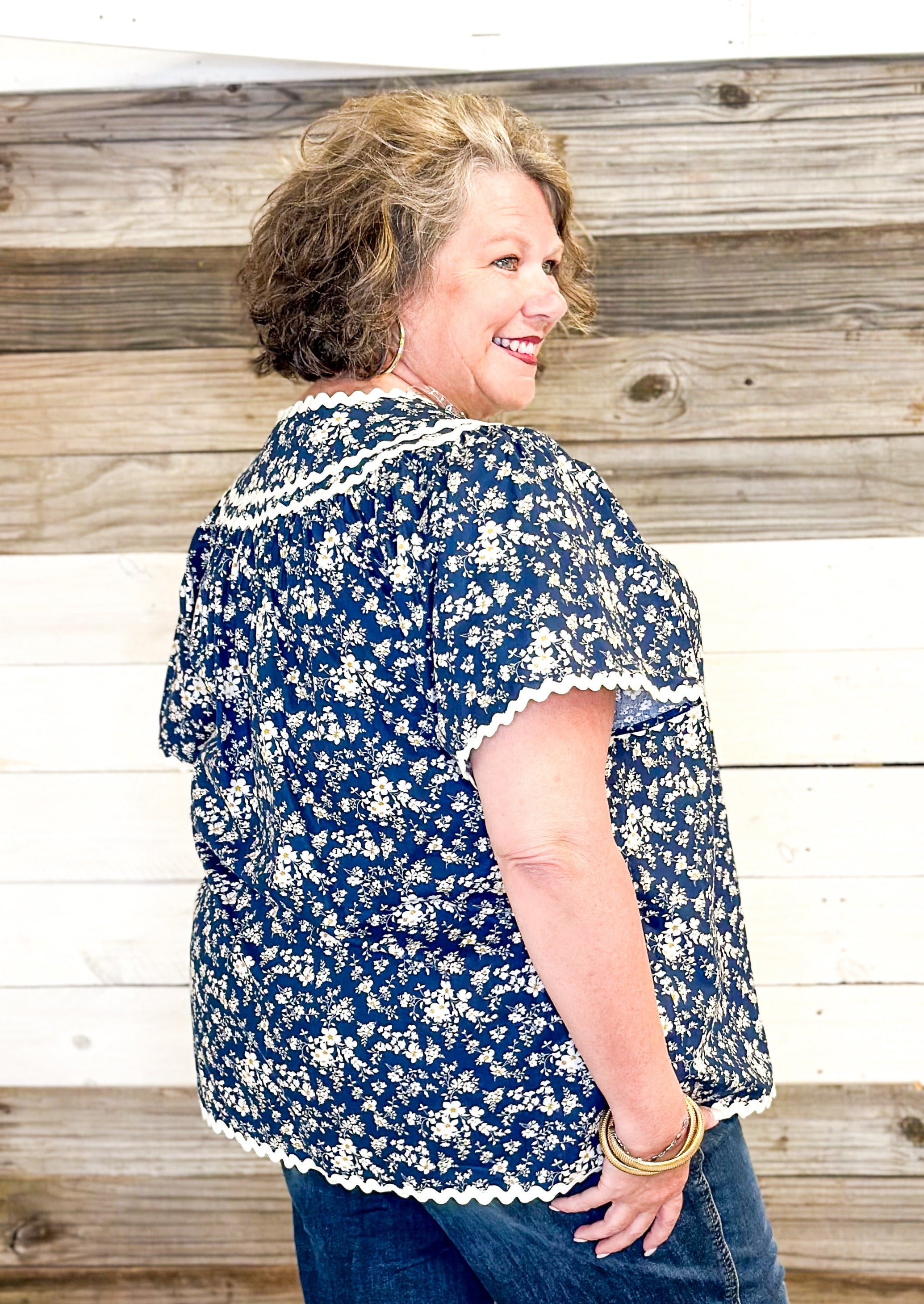 navy floral with hints of blue top - rick rack edging detail - small v-neck top with tie neck