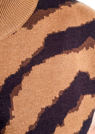 Close-up of a brown sweater with dark brown tiger stripes
