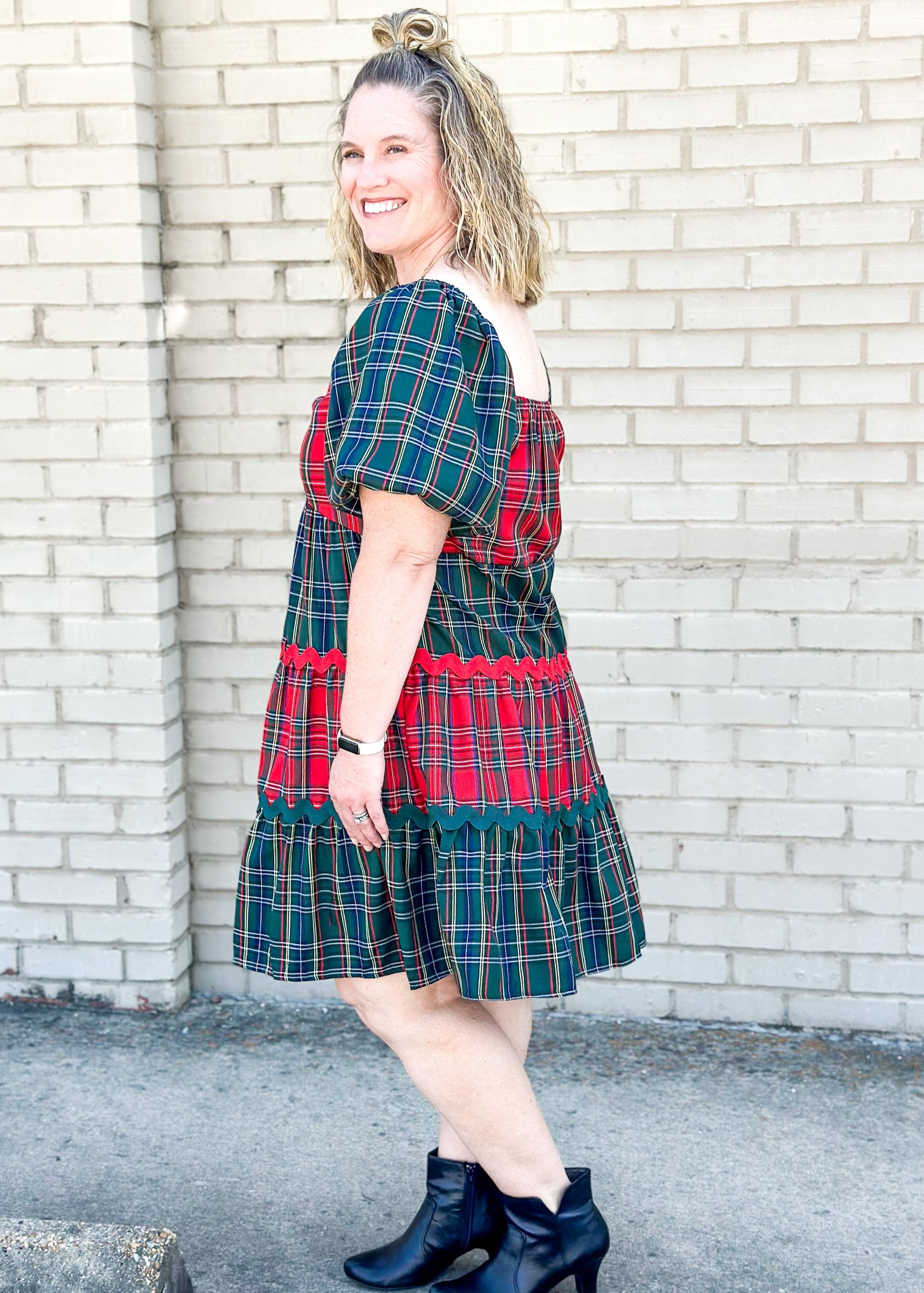 red and green tiered plaid dress - sleeves are green and alternating tiers of red and green plaid with red or green rick rack in between tiers