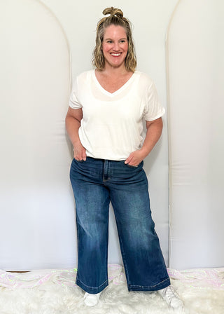Judy Blue high-waisted ankle jeans in a classic dark wash denim.