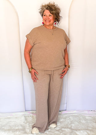 light brown two-piece lounge set with relaxed short sleeve top and wide-leg pants