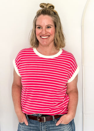wide striped top with cuffed sleeves, and white banded rounded neckline.